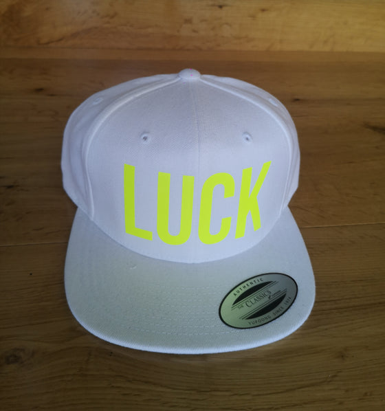 Flat Peak White Cap with Bright Yellow "LUCK"